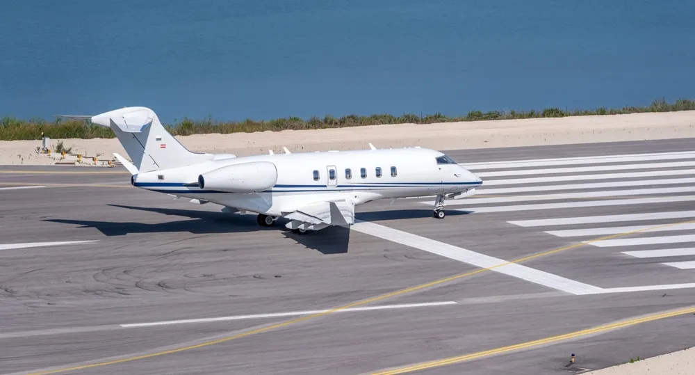 Private jet on coastal runway